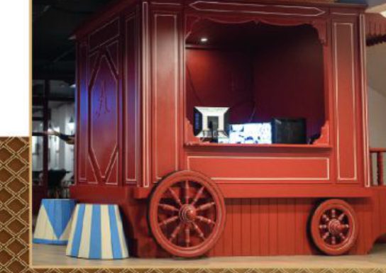 red circus-style food cart kiosk