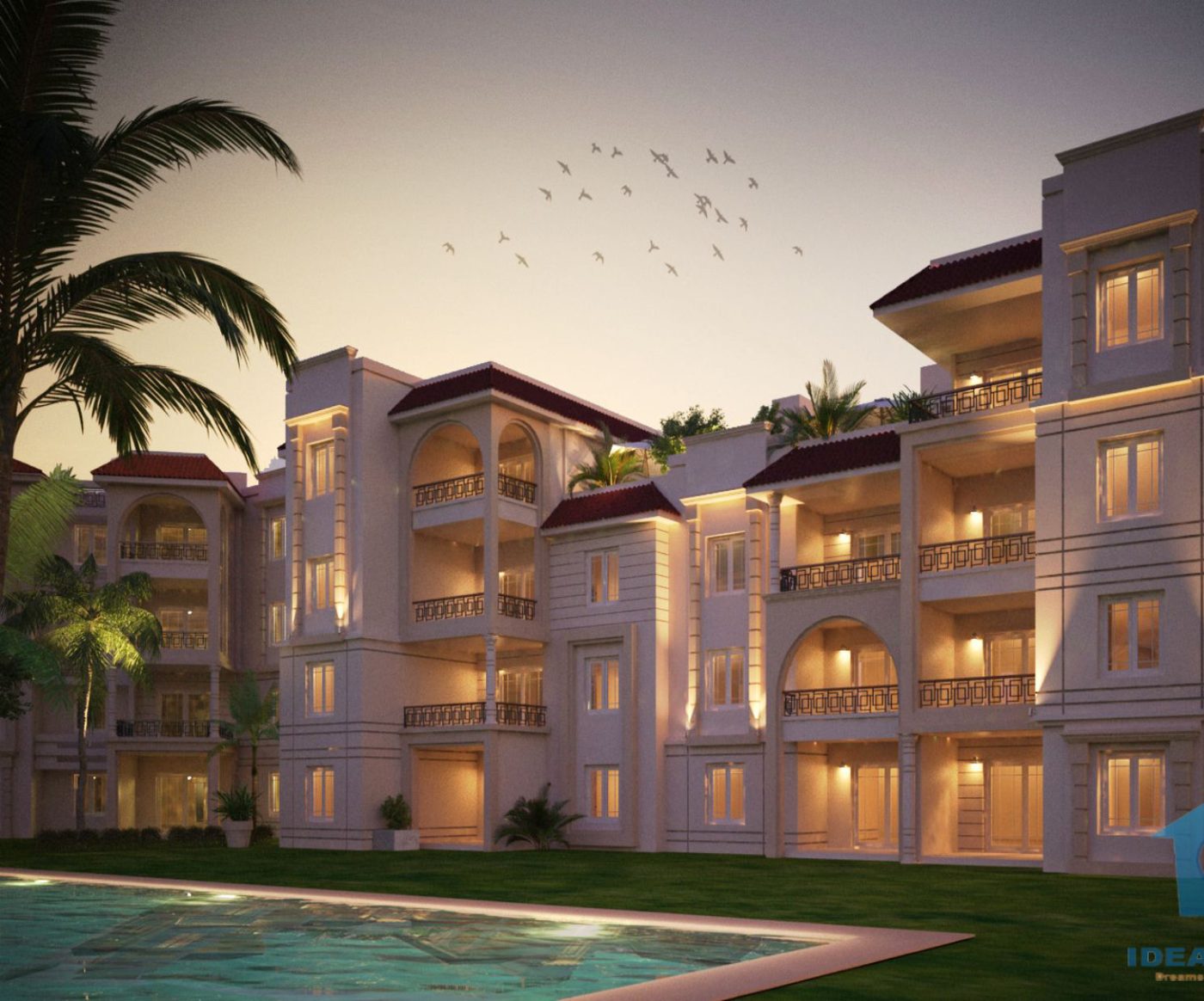 dusk apartment facade with pool and palms