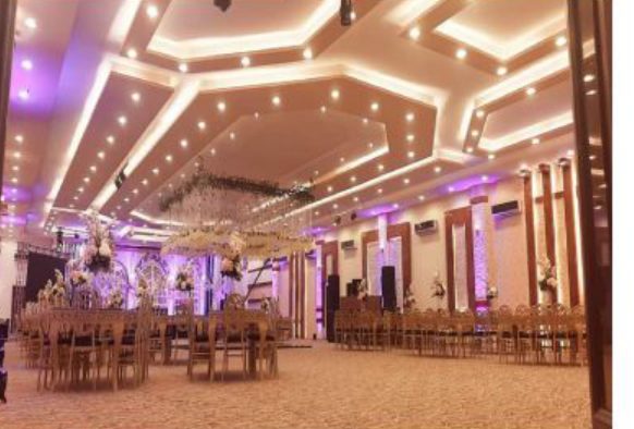 banquet hall set with round tables