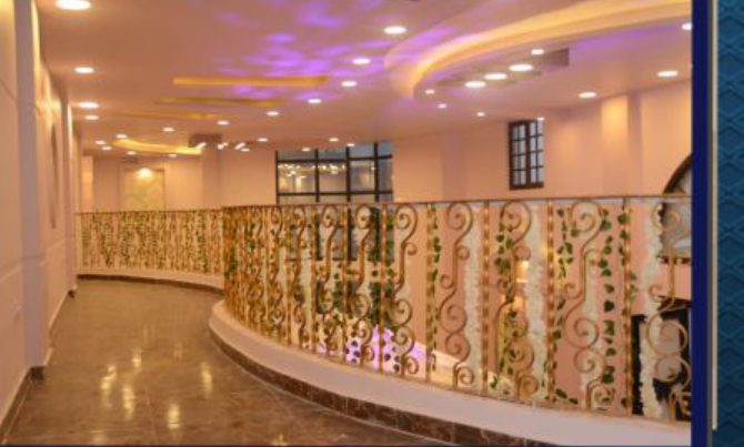 wedding hall entrance with floral arch