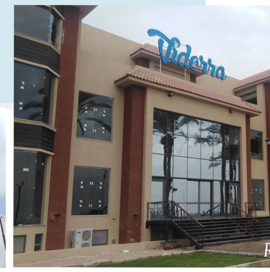 Vidorra entrance with signage — real photo of glazed front and stair approach