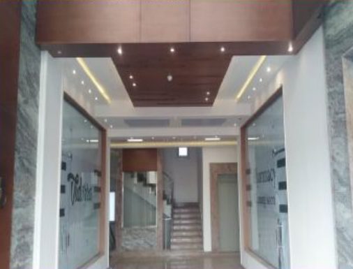 lobby entry with staircase and downlights