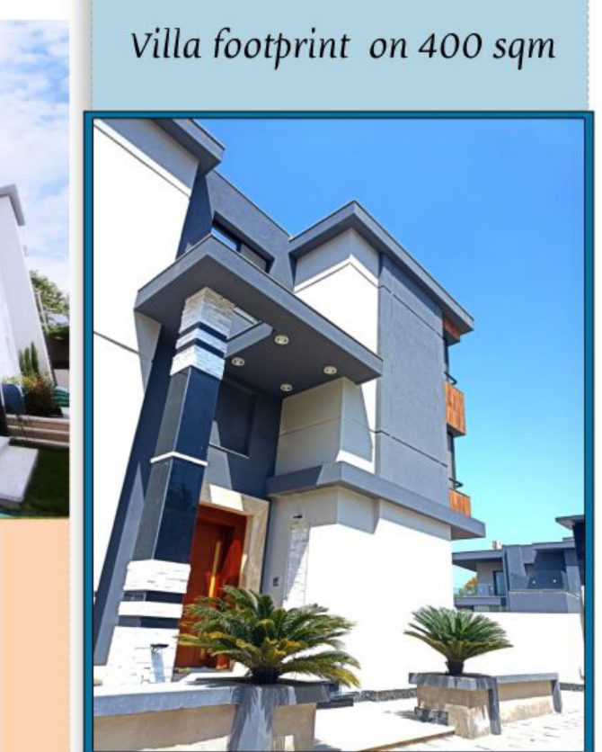 tall corner view of villa with palm tree