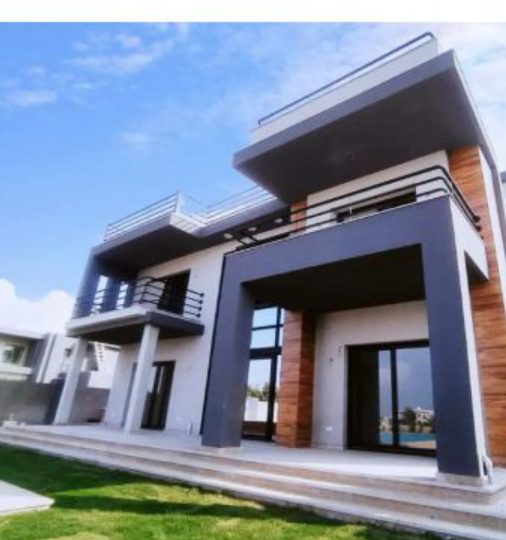 modern grey and wood villa front facade